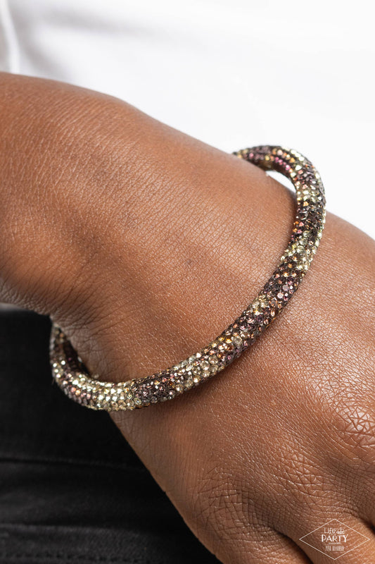 Stageworthy Sparkle Multi Flex Cuff Bracelet - Paparazzi Accessories  Item #P9RE-MTXX-154XX   Bedazzled in glittery, various multicolored rhinestones, a bendable cuff-like bracelet delicately curls around the wrist for a refined look.  Sold as one individual bracelet.