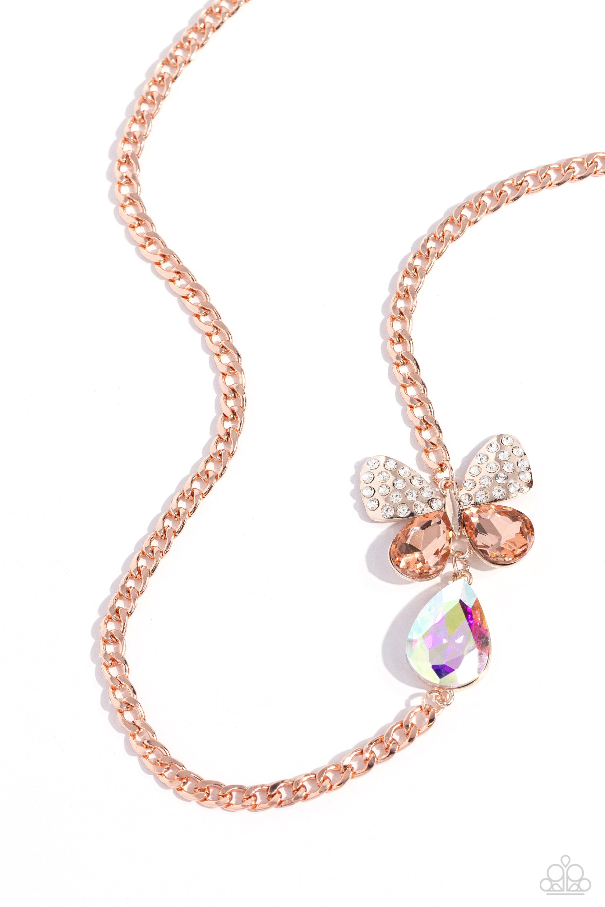 Fluttering Finesse Rose Gold Butterfly Necklace - Paparazzi Accessories  Infused along a rose gold chain, an oversized butterfly flutters above an iridescent teardrop. The upper wings of the butterfly feature white rhinestones, while the bottom wings are formed from faceted peachy teardrops for a whimsical finish. Features an adjustable clasp closure. Due to its prismatic palette, color may vary.  Sold as one individual necklace. Includes one pair of matching earrings.  P2ST-GDRS-163XX