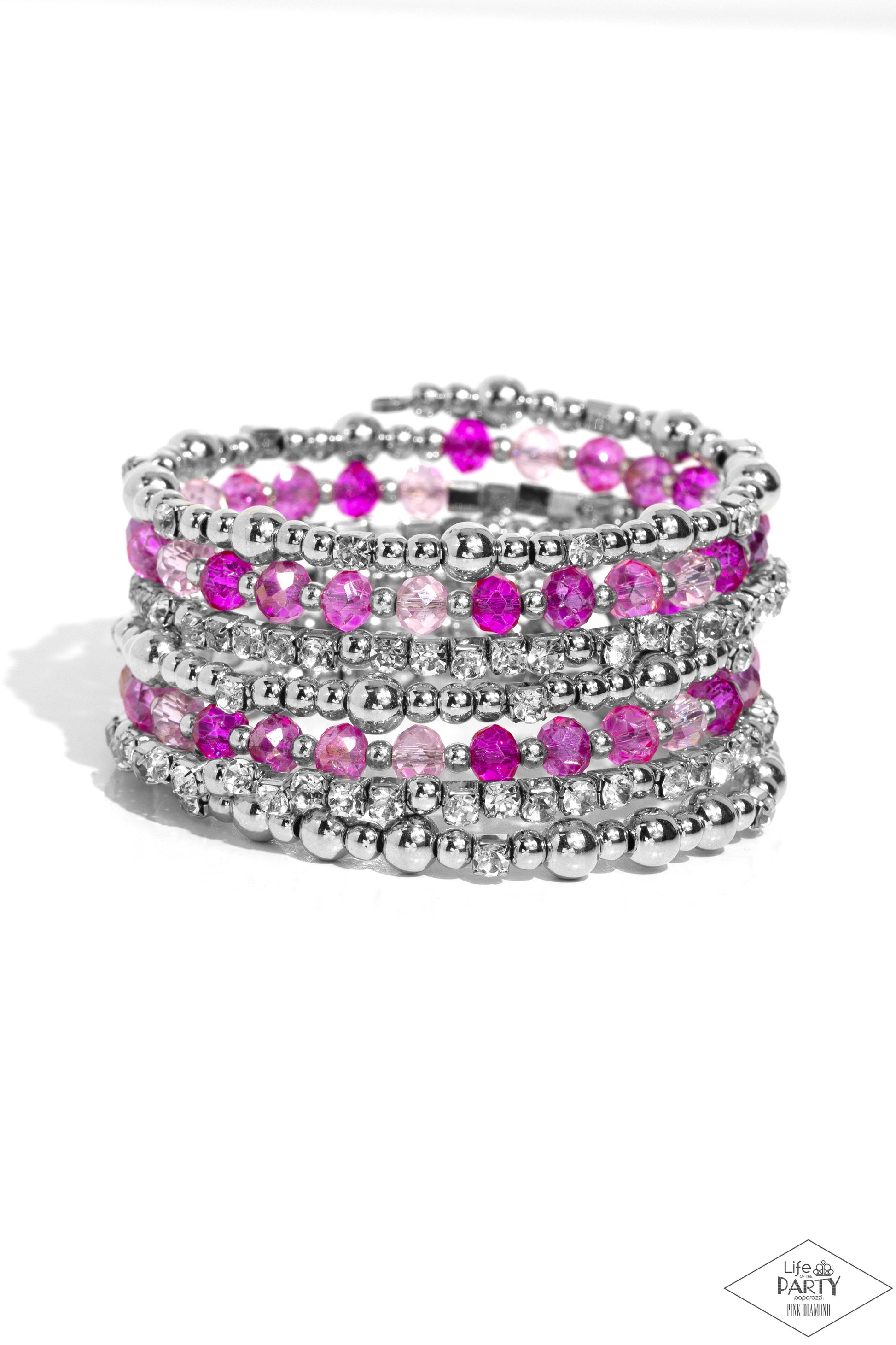 ICE Knowing You Pink Coil Bracelet - Paparazzi Accessories  An icy collection of silver beads, cubes, opaque crystals in various pink shades, and glassy white rhinestones are threaded along a coiled wire, creating a blinding infinity wrap style bracelet around the wrist.  Sold as one individual bracelet.  P9RE-PKXX-324XX