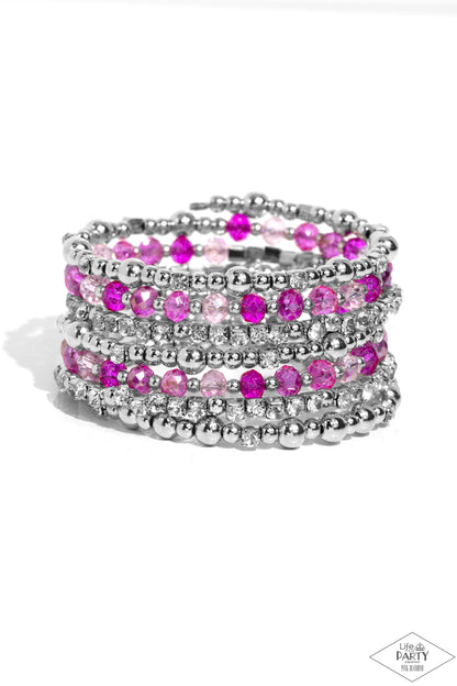 ICE Knowing You Pink Coil Bracelet - Paparazzi Accessories  An icy collection of silver beads, cubes, opaque crystals in various pink shades, and glassy white rhinestones are threaded along a coiled wire, creating a blinding infinity wrap style bracelet around the wrist.  Sold as one individual bracelet.  P9RE-PKXX-324XX