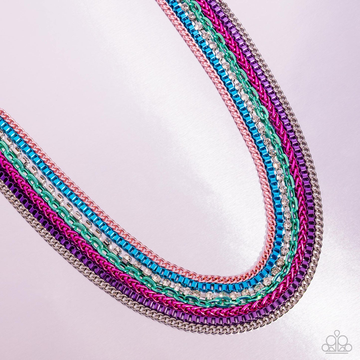 Troublemaker Trove Multi Necklace - Paparazzi Accessories  Rows of glistening multicolored chains, multicolored box-chains, and multicolored cable chains drape into endless layers of shimmer down the neckline. A row of classic white rhinestones, pressed into square frames, drips between the bulky layers, adding a dash of sparkle to the industrially colorful palette. Features an adjustable clasp closure.  Sold as one individual necklace. Includes one pair of matching earrings.  P2IN-MTXX-094XX