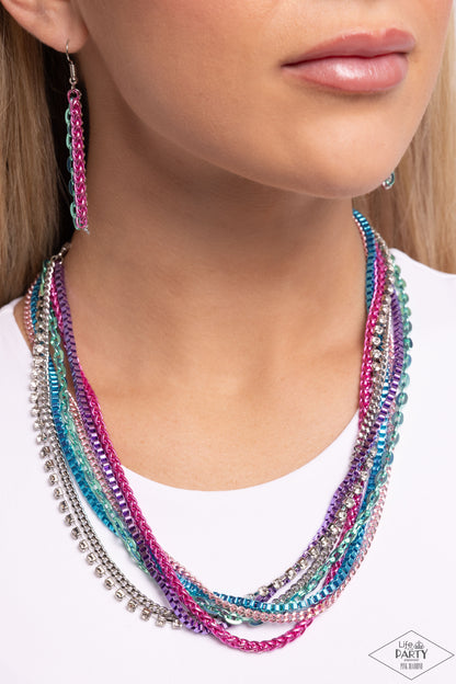 Troublemaker Trove Multi Necklace - Paparazzi Accessories  Rows of glistening multicolored chains, multicolored box-chains, and multicolored cable chains drape into endless layers of shimmer down the neckline. A row of classic white rhinestones, pressed into square frames, drips between the bulky layers, adding a dash of sparkle to the industrially colorful palette. Features an adjustable clasp closure.  Sold as one individual necklace. Includes one pair of matching earrings.  P2IN-MTXX-094XX