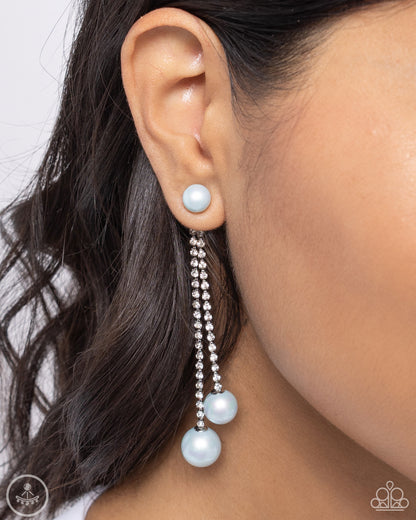 Give Us A PEARL! Blue Jacket Earring - Paparazzi Accessories  A solitaire light blue pearl attaches to a double-sided post designed to fasten behind the ear. Dotted in dainty white rhinestones, a duo of shimmery silver box chains swings from the bottom of the solitaire pearl fitting with additional light blue pearls peeking out behind the ear for a refining finish. Earring attaches to a standard post fitting.  Sold as one pair of post earrings.  P5PO-BLXX-180XX