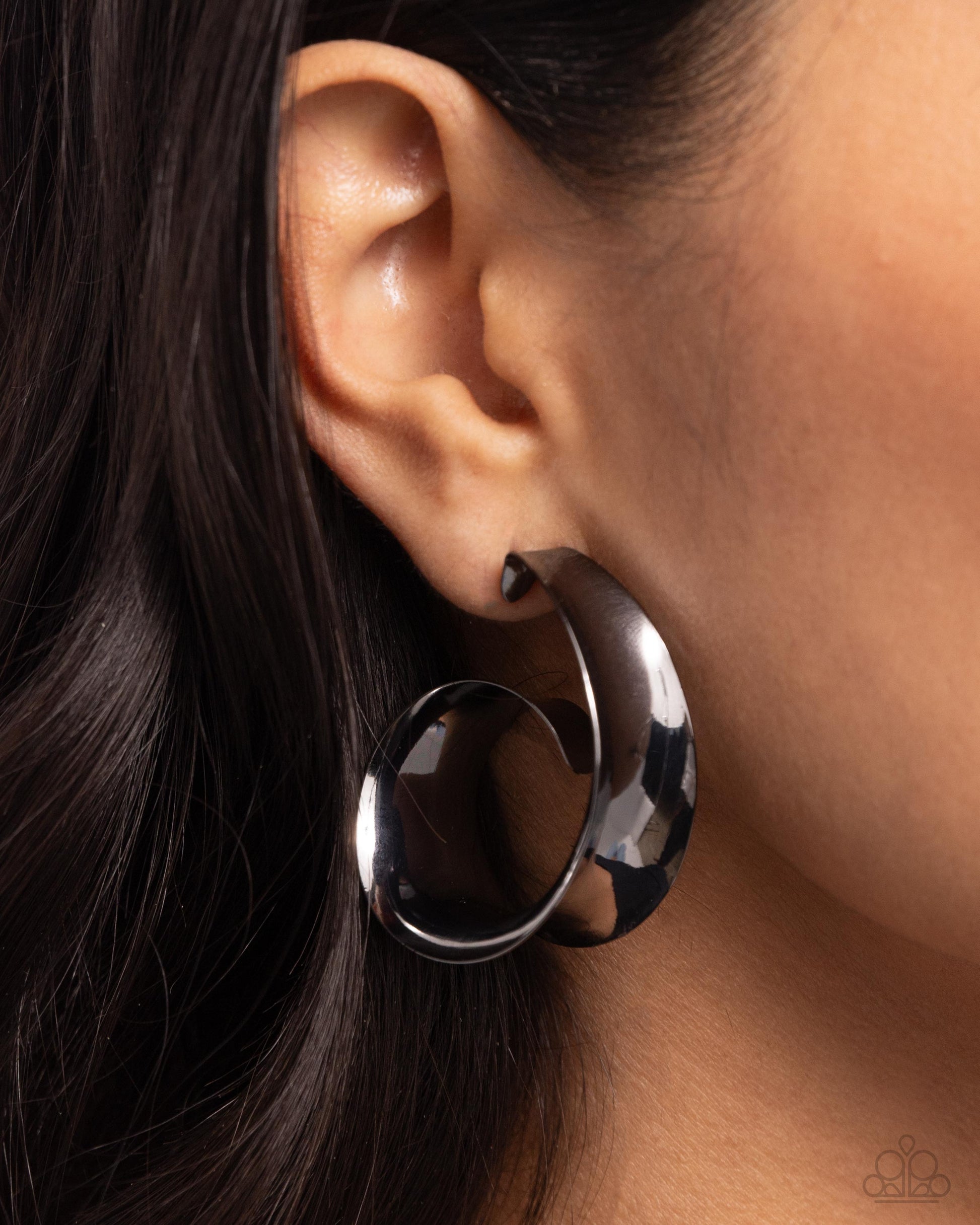 Curly Cadence Black Hoop Earring - Paparazzi Accessories  Featuring a sleek finish, a thick band of gunmetal curls into a dainty swirl at the bottom of the ear for an eye-catching centerpiece. Earring attaches to a standard post fitting. Hoop measures approximately 1 1/2" in diameter.  Sold as one pair of hoop earrings.  P5HO-BKXX-276XX