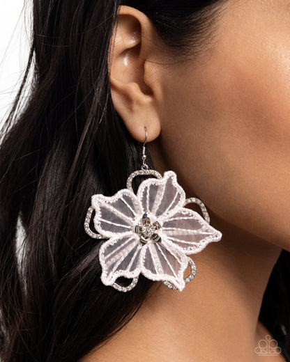 Refined Recognition White Flower Earring - Paparazzi Accessories  Delicately perched atop an airy, silver, white rhinestone-encrusted floral frame, a white lace appliqué flower blooms from the ear. Smaller, dainty silver petals bloom from a white gem center atop the white lace appliqué, creating the ultimate three-dimensional, whimsically elegant centerpiece. Earring attaches to a standard fishhook fitting.  Sold as one pair of earrings.  P5RE-WTXX-619XX