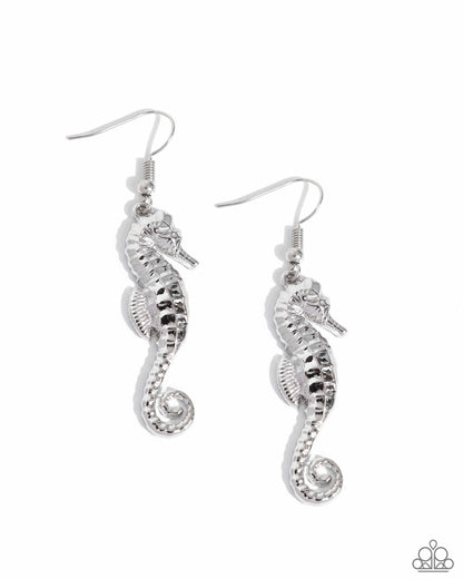 Seahorse Sheen Silver Earring - Paparazzi Accessories  A tactile detailed oversized silver seahorse cascades below the ear for a monochromatic, maritime display. Earring attaches to a standard fishhook fitting.  Sold as one pair of earrings.  P5SE-SVXX-199XR