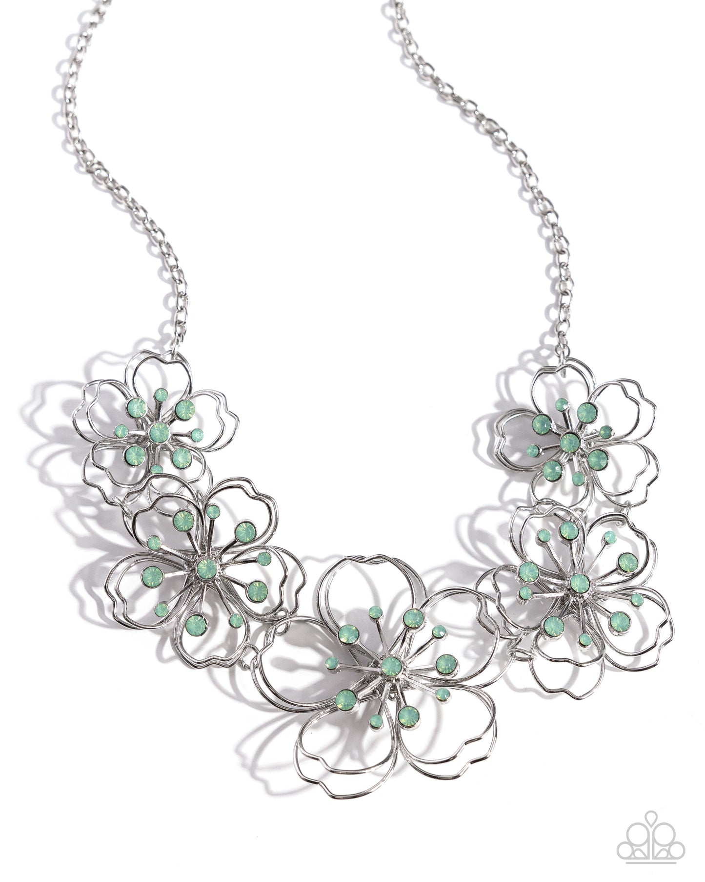 Wiry Wallflowers Green Flower Necklace - Paparazzi Accessories  Shiny silver wire delicately twists into layered blossoms with light green opalescent rhinestone floral centers. Varying in size, the airy floral frames delicately link into an asymmetrical display as the layered frames elegantly pop beneath the collar. Features an adjustable clasp closure.  Sold as one individual necklace. Includes one pair of matching earrings.  P2WH-GRXX-411XX