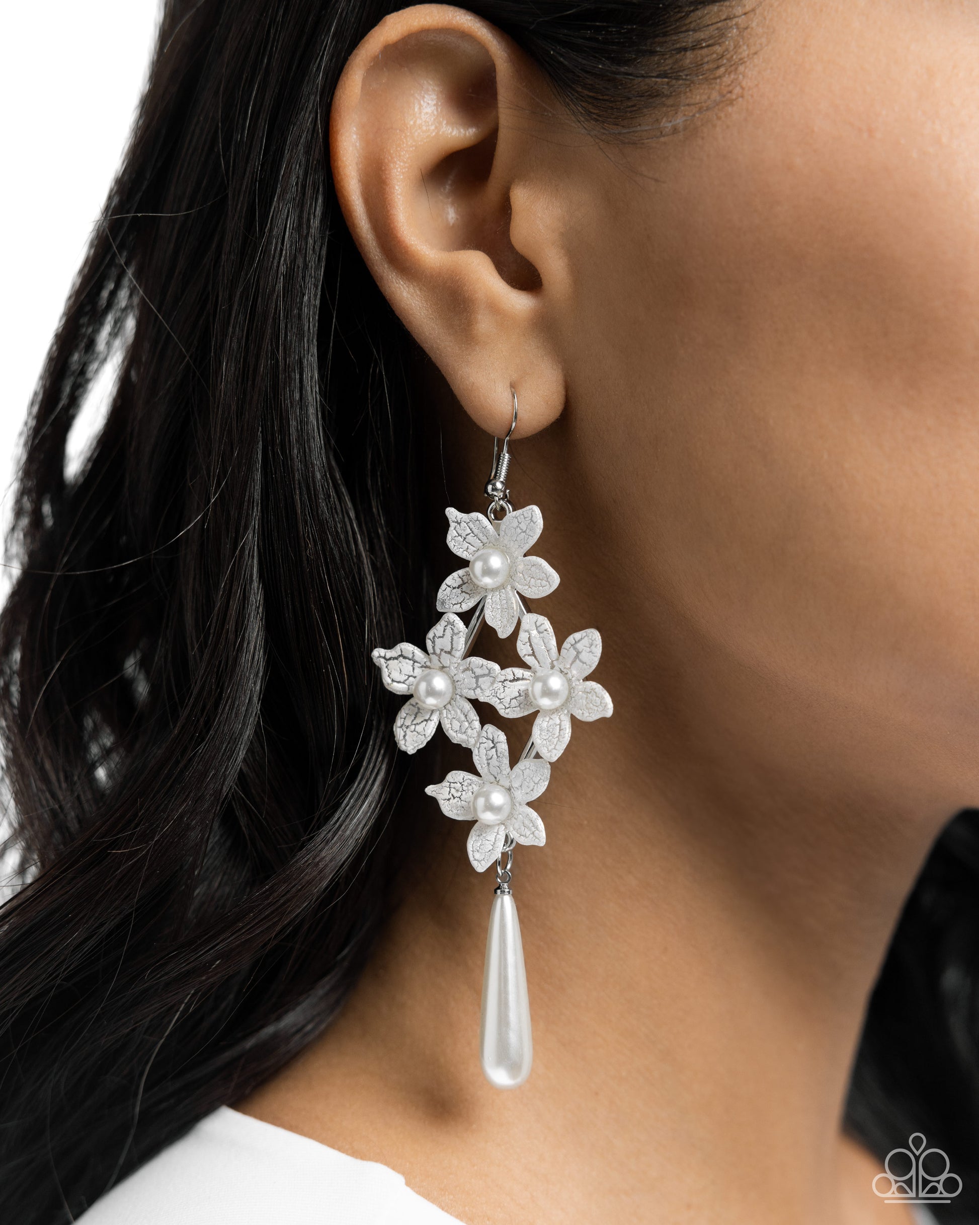 Vintage Veining White Pearl Flower Earring - Paparazzi Accessories  Featuring white pearl centers, white crackle flowers form in a diamond shape below the ear. An elongated white teardrop pearl cascades below the floral arrangement for an additional spot of color and whimsy. Earring attaches to a standard fishhook fitting.  Sold as one pair of earrings.  P5WH-WTXX-279XX