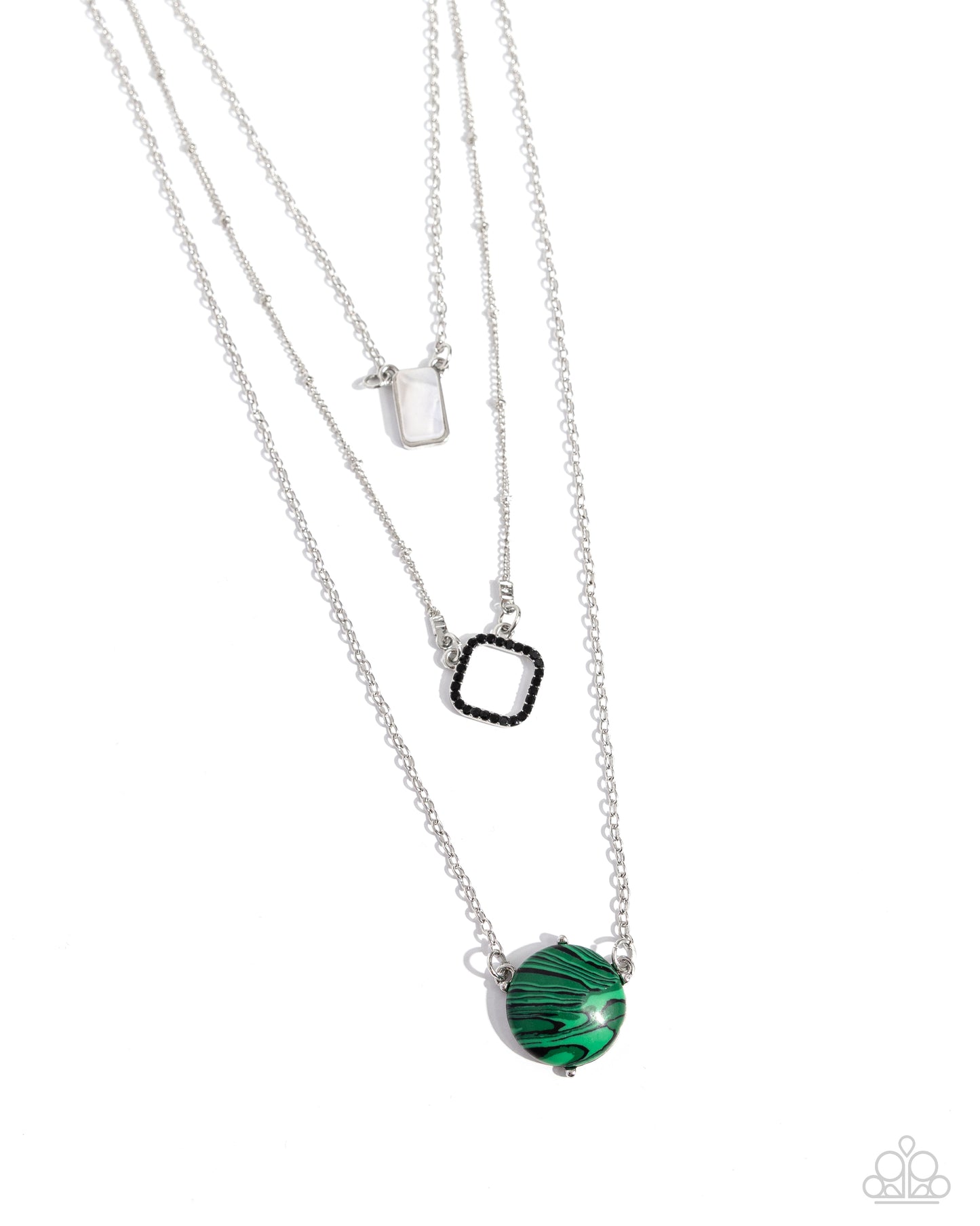 Playfully Panache Green Necklace - Paparazzi Accessories Infused with three colorful pendants, three shimmery silver chains layer across the chest. Pressed in a silver rectangular frame, a white shell swings from the uppermost chain above a jet-black rhinestone-encrusted diamond-shaped frame. A green-marbled stone hangs from the lowermost chain for a playful vibe. As the stone elements in this piece are natural, some color variation is normal. Includes one pair of matching earrings. P2SE-GRXX-278XX