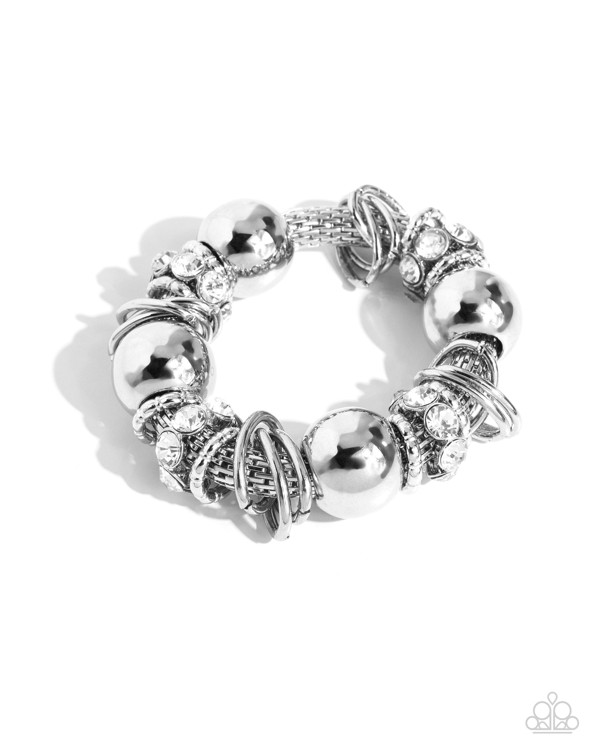 Coiled Confidence White Stretch Bracelet - Paparazzi Accessories  Infused along an industrial abstract stretchy chain, a collection of interlocking silver rings, oversized silver beads, and white gem-encrusted silver accents twists and coils along the wrist for a charismatically confident look.  Sold as one individual bracelet.  P9ED-WTXX-058XX