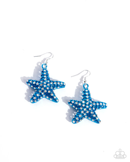 Skilled Starfish Blue Earring - Paparazzi Accessories  Featuring an explosion of dainty white rhinestones, an airy blue starfish charm flickers and flashes below the ear for a seaworthy statement. Earring attaches to a standard fishhook fitting.  Sold as one pair of earrings.  P5ST-BLXX-053XX