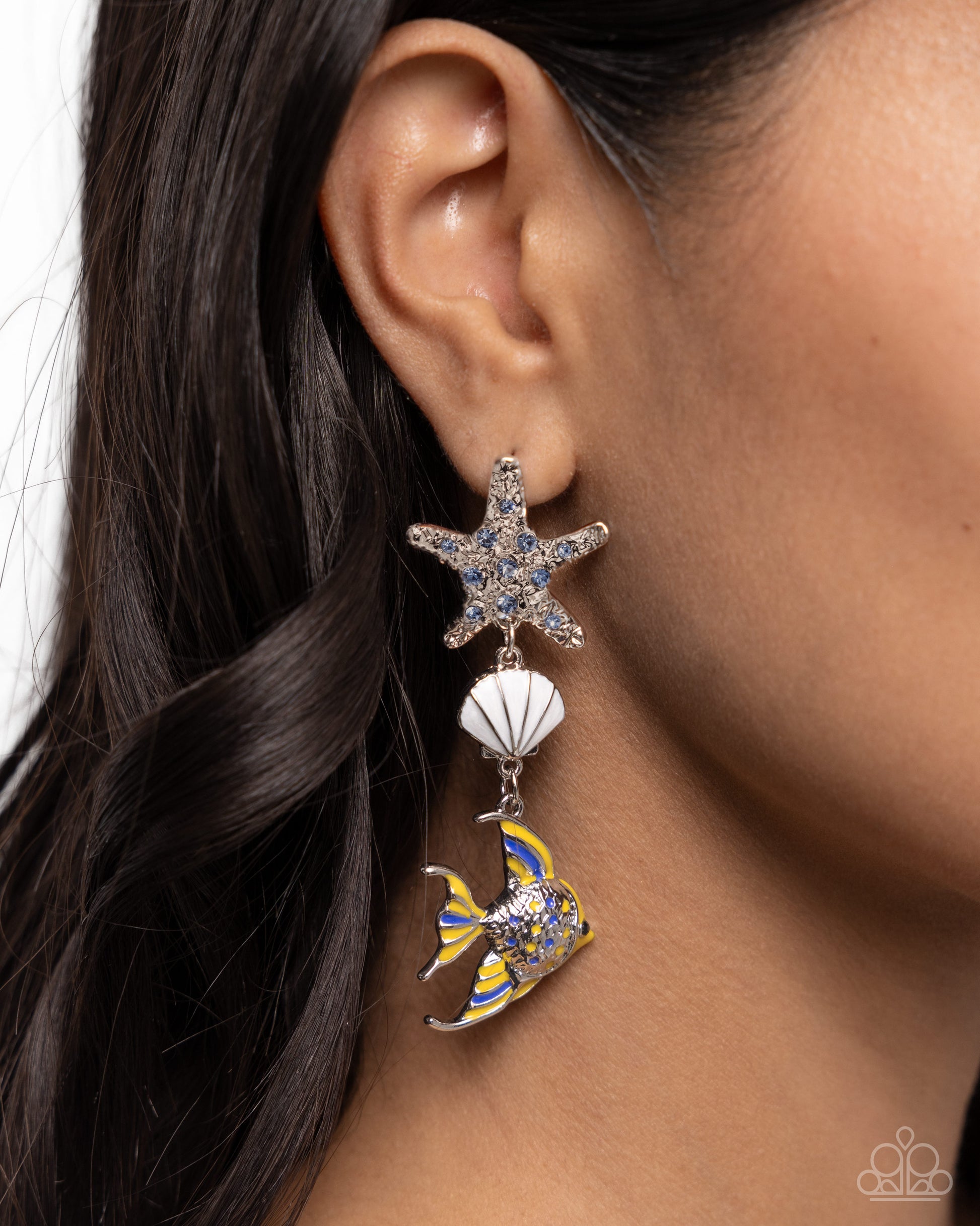 Under the Reef Multi Earring - Paparazzi Accessories  Featuring dainty blue rhinestones, a silver shatter-hammered starfish shimmers from the ear, giving way to a white pearl-painted silver seashell and royal blue and High Visibility-detailed and painted silver fish for a colorfully coastal look. Earring attaches to a standard post fitting.  Sold as one pair of post earrings.  P5PO-MTXX-135XX