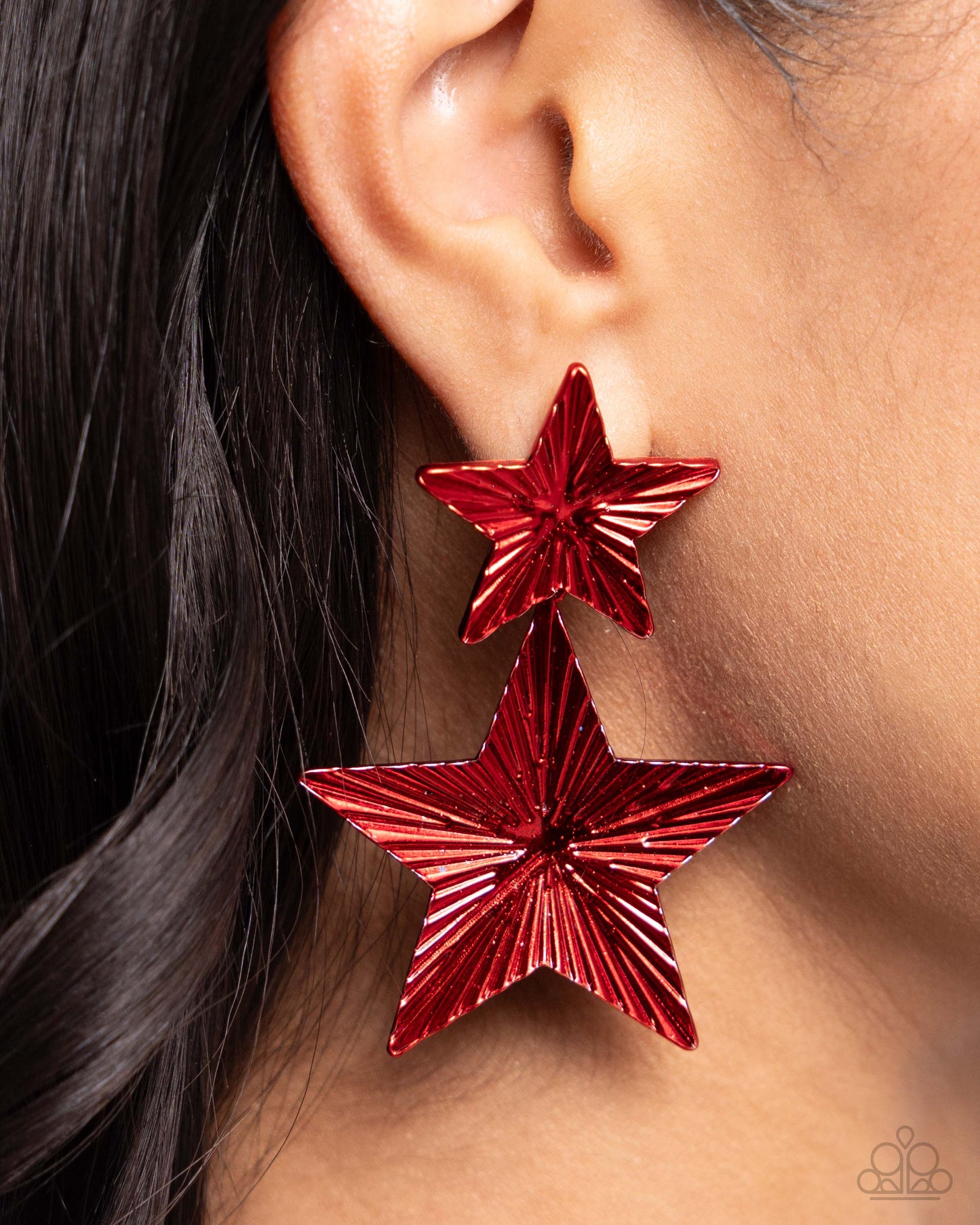 Patriotic Promise Red Star Post Earring - Paparazzi Accessories  Delicately fluted in shimmery textures, vibrant red stars, one larger than the other, delicately link into a stacked, patriotic lure. Earring attaches to a standard post fitting.  Sold as one pair of post earrings.  P5PO-RDXX-067XX