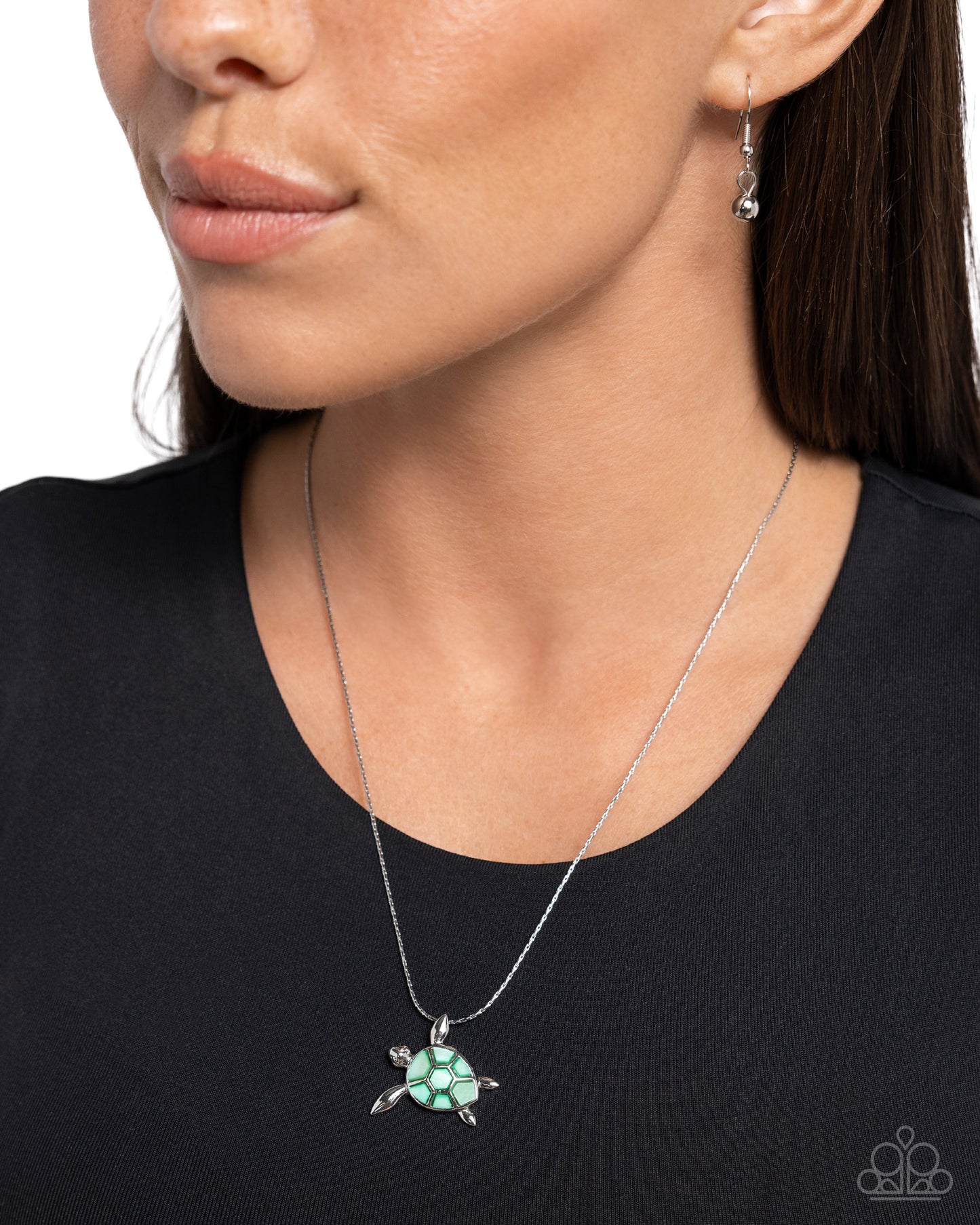 Sea Turtle Statement Green Necklace - Paparazzi Accessories  Featuring chiseled pieces of green shell, a silver sea turtle charm swims along a dainty silver chain below the neckline from one of its glistening silver fins for a tilted tidal look. Features an adjustable clasp closure.  Sold as one individual necklace. Includes one pair of matching earrings.  P2SE-GRXX-283XX