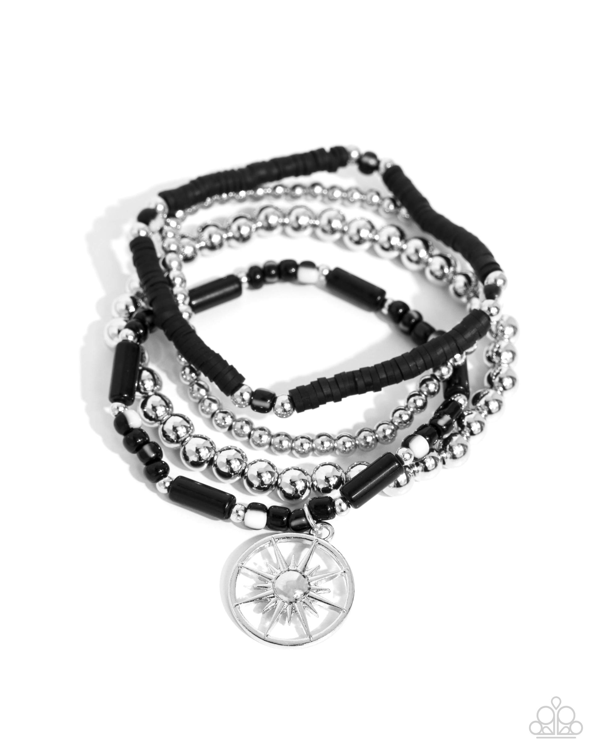 Nuanced Navigator Black Stretch Bracelet - Paparazzi Accessories  Infused along elastic stretchy bands, a collection of black-and-white striped beads, silver, and black beads in varying sizes, black clay discs, and a silver sunburst compass charm swing and stack along the wrist for a noteworthy look.  Sold as one set of four bracelets.  P9BA-BKXX-125XX