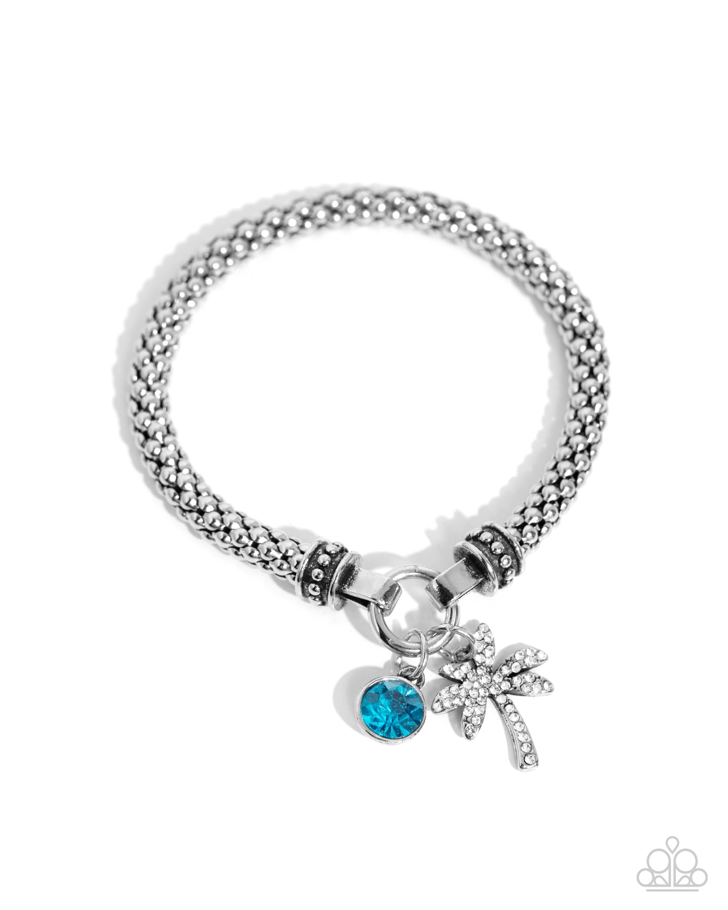 Palm Beach Bling Blue Bracelet - Paparazzi Accessories  Featuring a high-sheen finish, a rounded silver mesh claw chain streams along the wrist from silver studded caps on a stretchy band. The meshed strand attaches to a silver ring at the center of the wrist where a white rhinestone-encrusted palm tree and solitaire blue zircon gem pressed in a silver fitting swing for a whimsical finish.  Sold as one individual bracelet.  P9RE-BLXX-266XX