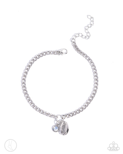 Conch Comeback White Anklet - Paparazzi Accessories  Attached to a silver ring, an opalescent white bead, and a silver conch shell swing from a silver curb chain around the ankle for a charming, coastal centerpiece. Features an adjustable clasp closure.  Sold as one individual anklet.  P9AN-WTXX-065XX