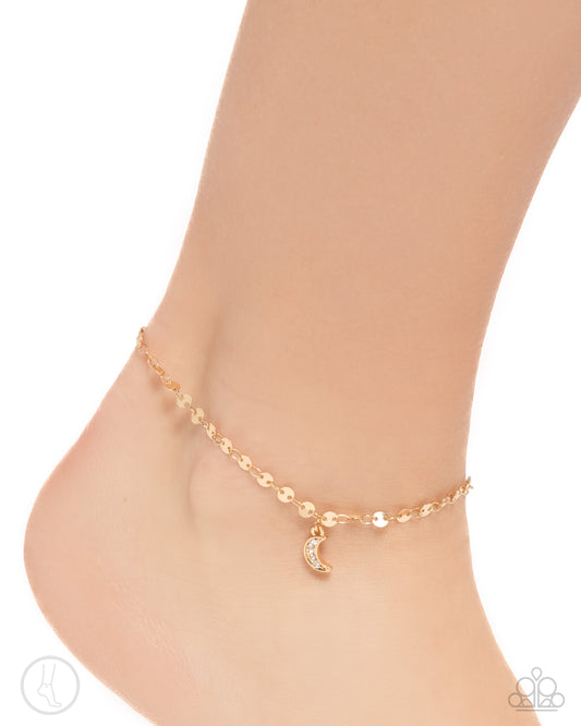 Crescent Chic Gold Moon Anklet - Paparazzi Accessories  A rounded gold soda tab-inspired chain circles around the ankle while a dainty white rhinestone-encrusted gold crescent moon swings for a charmingly cosmic look. Features an adjustable clasp closure.  Sold as one individual anklet.  P9AN-GDXX-087XX