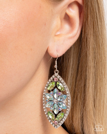 Gallant Garden Blue Earring - Paparazzi Accessories Pronged along the inner surface of a silver teardrop, a collection of green marquise-cut gem leaves bloom from solitaire light rose rhinestones while a white rhinestone-centered blue marquise-cut gem flower is featured in the center. Iridescent rhinestones frame around the blue flower for a touch of radiance while the teardrop frame itself is bordered in white rhinestones for a sparkly finish. P5RE-BLXX-312XX