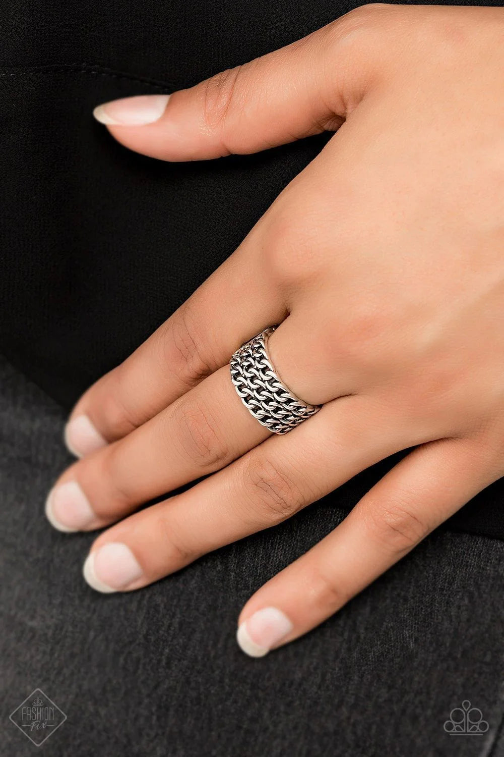 Ring: "Metro Maker" (P4IN-SVXX-092MS)  Three rows of shimmery silver chain links stack across the finger, coalescing into an edgy layered band. Features a stretchy band for a flexible fit.&nbsp;