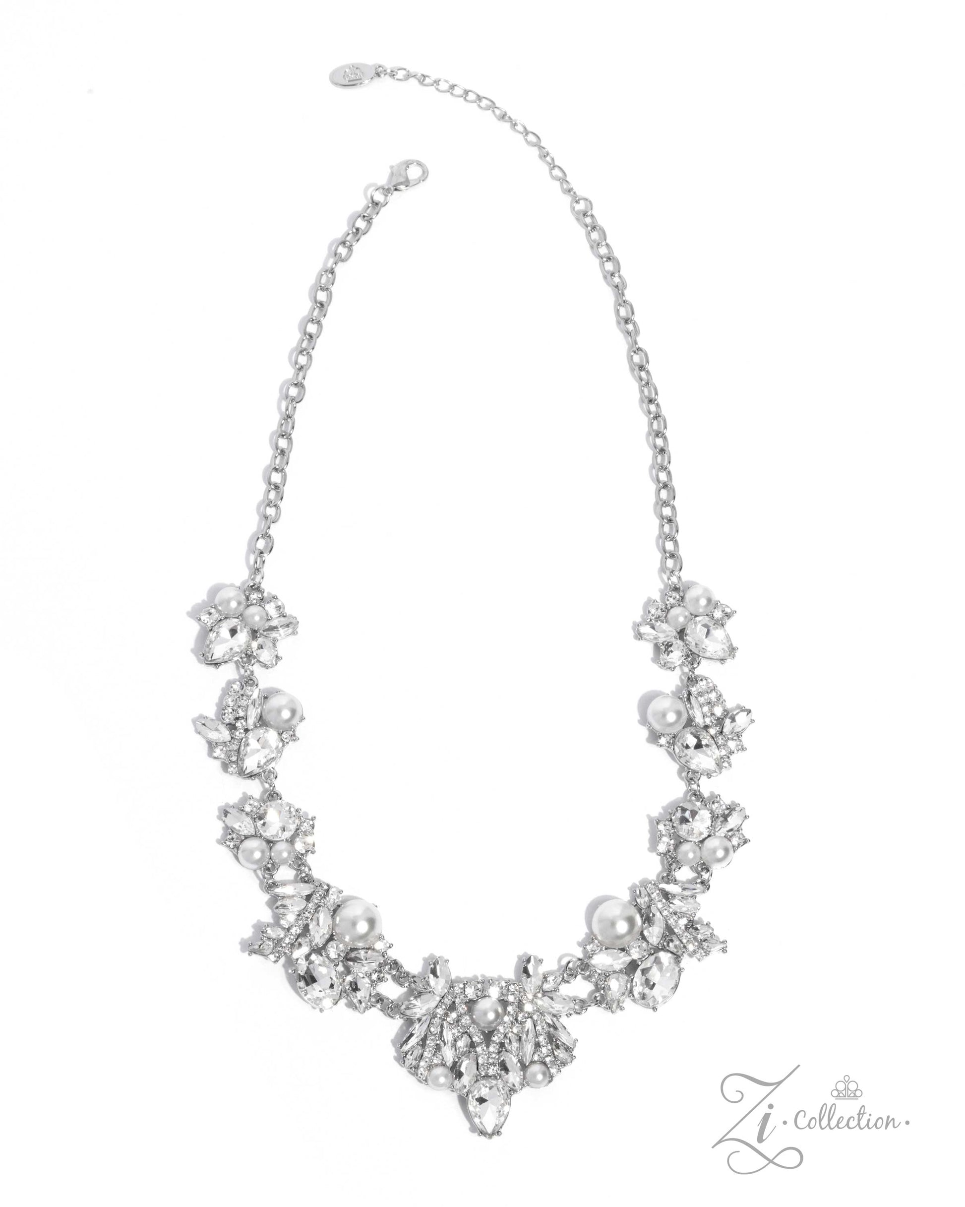 The Aleshia White Pearl 2024 Zi Necklace - Paparazzi Accessories  Item #Z2410   Clusters of marquise-cut and teardrop gems, round white rhinestones, white pearls, and pieces of rhinestone-encrusted silver bars link together along the collar, creating an explosion of extravagant sparkle. The dramatic angles of the silver bars exaggerate the dramatic crystal-like radiance of each pronged gem, adding further dimension to the design. The size and intensity of the radically refined clusters slowly increase as th