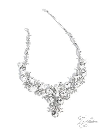 The Gesphania White Rhinestone 2024 Zi Necklace - Paparazzi Accessories  Item #Z2403  Curls of white rhinestone-embellished silver frames in varying sizes, and white teardrop gems bloom along the neckline, leading the eye to a shimmery luminescent floral centerpiece adorned in dizzying, intricate detail. An additional flourish of shimmery silver curls and a white teardrop gem cascades below the floral centerpiece, resulting in an unforgettable statement piece that sparkles with sentiment. Features an adjust