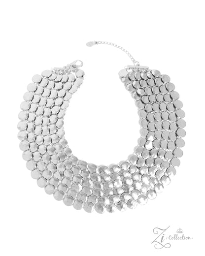 The Kelly Silver 2024 Zi Necklace - Paparazzi Accessories  Item #Z2404  Featuring a subtly hammered finish, a collection of shiny silver discs delicately connect into statement-making rows, cascading below the neckline in layers and showcasing their intense detail and highly reflective luminescence. Features an adjustable clasp closure.  Sold as one individual necklace. Includes one pair of matching earrings.&nbsp;  Named after the 2024 Seize the Spotlight winner, Kelly L.