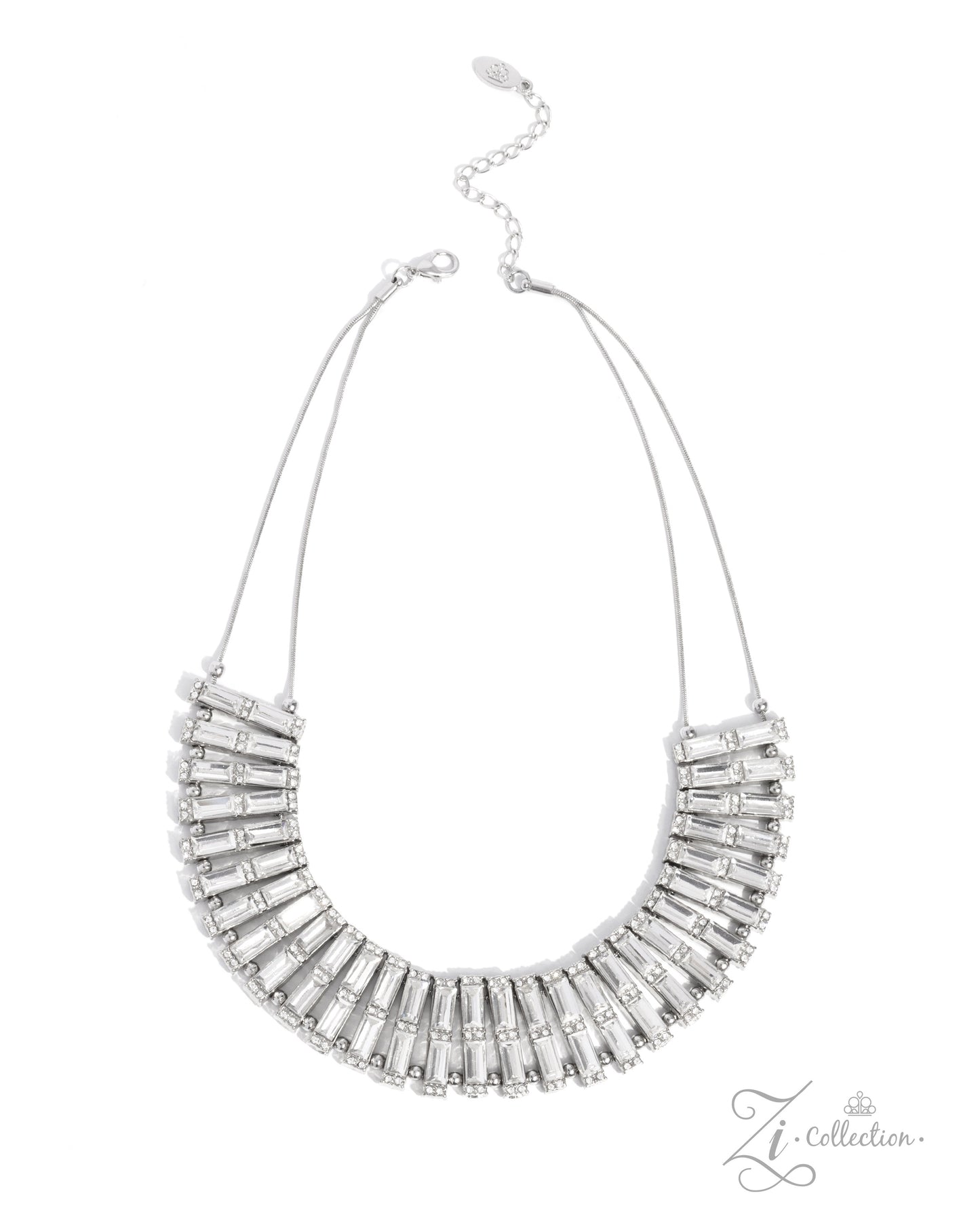 The Leslie White Rhinestone 2024 Zi Necklace - Paparazzi Accessories  Item #Z2402   Shimmery bars, made up of stacks of emerald-cut white gems, slide along two skinny snake chains, with sleek metallic beads separating each one. Duos of dainty white rhinestones are stamped across the surface of each layer, emitting a timeless twinkle, resulting in a collision of light-reflecting texture and sheen. Features an adjustable clasp closure.  Sold as one individual necklace. Includes one pair of matching earrings. 