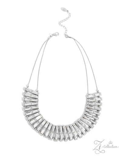 The Leslie White Rhinestone 2024 Zi Necklace - Paparazzi Accessories  Item #Z2402   Shimmery bars, made up of stacks of emerald-cut white gems, slide along two skinny snake chains, with sleek metallic beads separating each one. Duos of dainty white rhinestones are stamped across the surface of each layer, emitting a timeless twinkle, resulting in a collision of light-reflecting texture and sheen. Features an adjustable clasp closure.  Sold as one individual necklace. Includes one pair of matching earrings. 