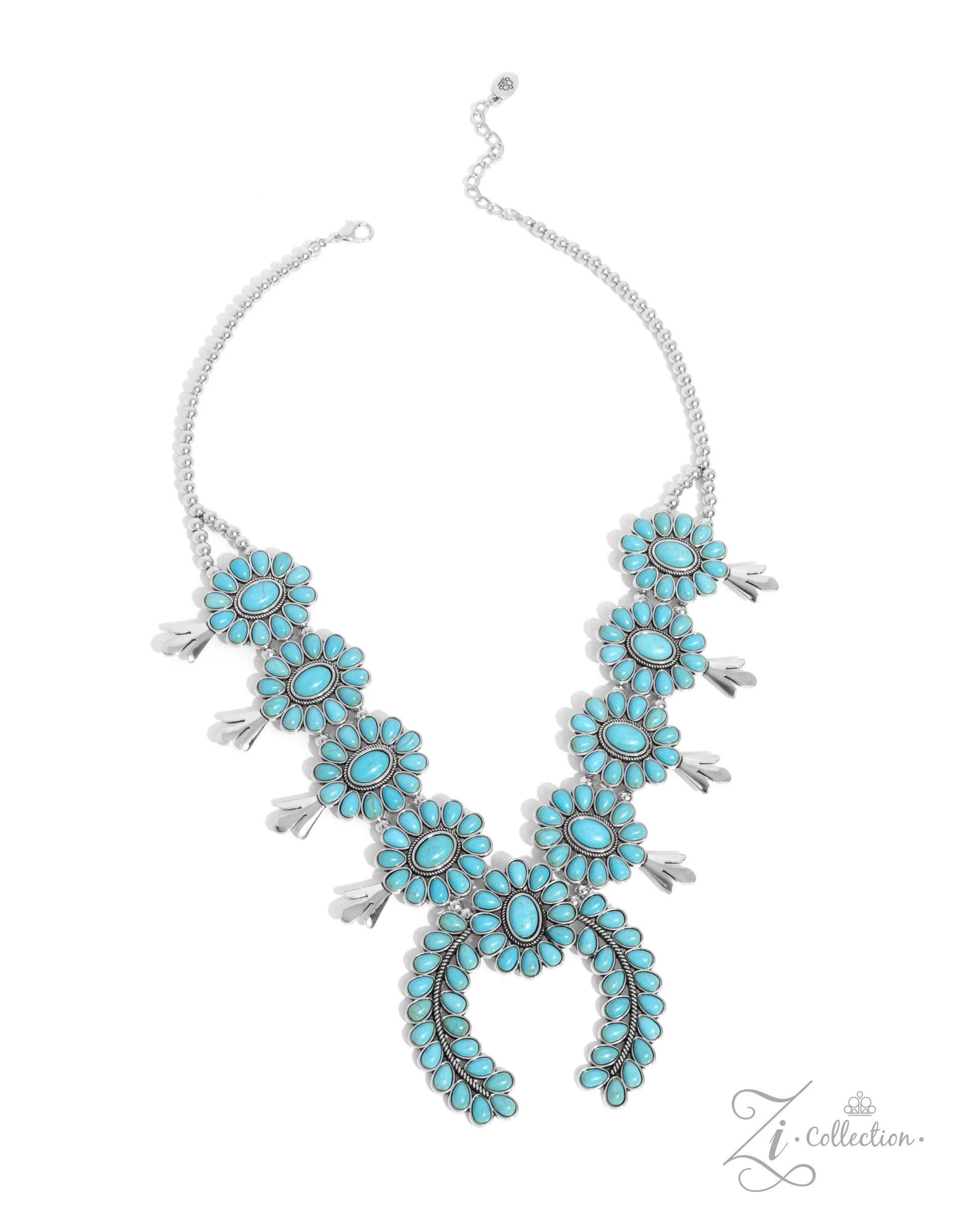 The Shelby Turquoise 2024 Zi Necklace - Paparazzi Accessories  Item #Z2409  A collection of turquoise stone-embellished squash blossom frames, with an oversized crescent-shaped pendant at its center, cascades below the neckline from a strand of silver beads that split into two distinct strands. The vibrant splashes of color and antiqued rope-textured centers of the squash blossom frames infuse the rustic design with a hint of surprising whimsicality and traditional timelessness. Features an adjustable clasp