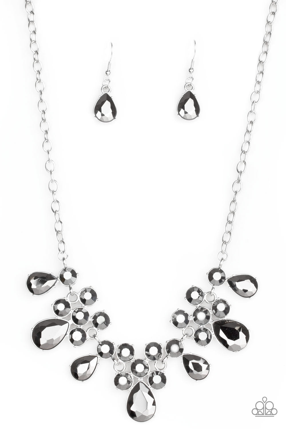 Debutante Drama Silver Necklace - Paparazzi Accessories  A collection of round and teardrop hematite rhinestones coalesce into dazzling frames as they link below the collar, creating a glamorous fringe. Features an adjustable clasp closure. All Paparazzi Accessories are lead free and nickel free!  Sold as one individual necklace. Includes one pair of matching earrings.