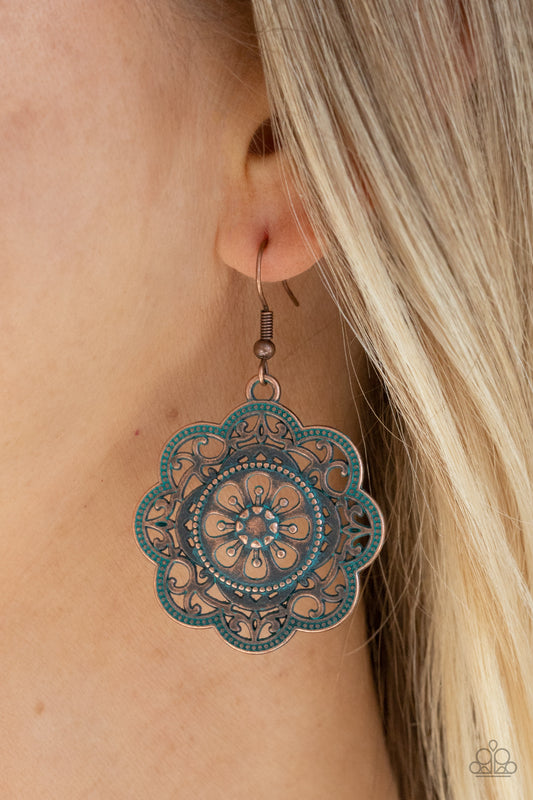 Western Mandalas Copper Earring - Paparazzi Accessories  Featuring a rustic patina finish, a decorative mandala-like copper frame swings from the ear for a whimsical look. Earring attaches to a standard fishhook fitting.  ﻿All Paparazzi Accessories are lead free and nickel free!  Sold as one pair of earrings.