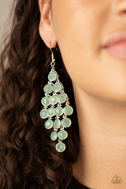 With All DEW Respect Green Earring - Paparazzi Accessories  Encased in sleek silver fittings, a crystal-like collection of Green Ash gems trickle from a silver netted backdrop, creating a dewy display. Earring attaches to a standard fishhook fitting.  All Paparazzi Accessories are lead free and nickel free!  Sold as one pair of earrings.