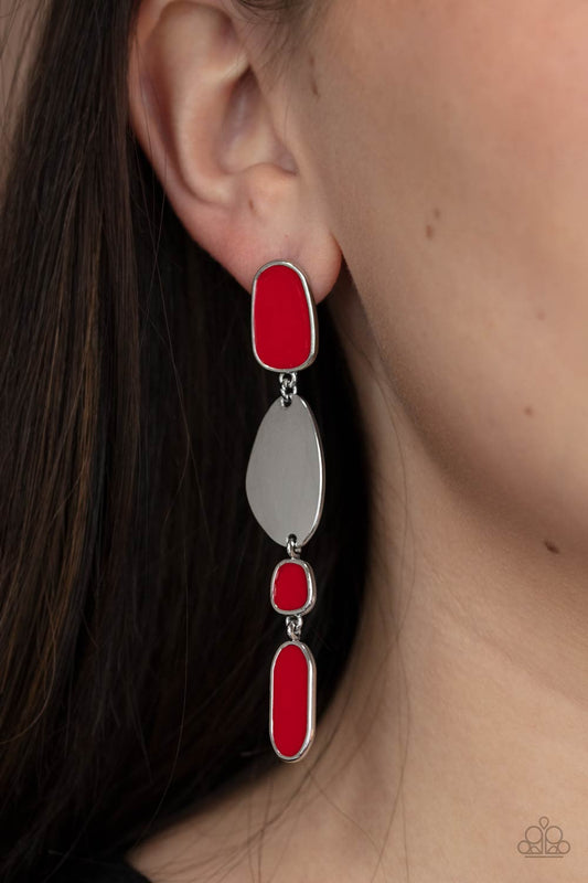 Deco By Design Red Post Earring - Paparazzi Accessories  Painted in a fiery red finish, a shiny collection of asymmetrical frames link with a glistening silver frame, creating an abstract lure. Earring attaches to a standard post fitting.  All Paparazzi Accessories are lead free and nickel free!  Sold as one pair of post earrings.