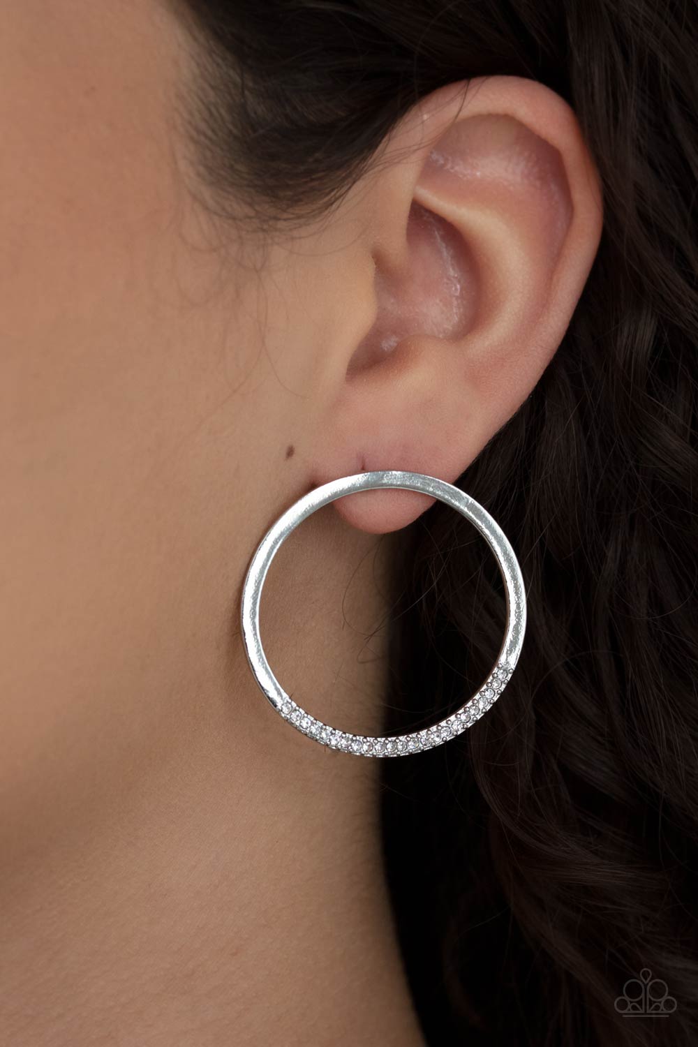 Spot On Opulence White Post Earring - Paparazzi Accessories As if dipped in glitter, the bottom of a flat silver hoop is encrusted in dainty white rhinestones for a classic shimmer. Earring attaches to a standard post fitting.  All Paparazzi Accessories are lead free and nickel free!  Sold as one pair of post earrings.