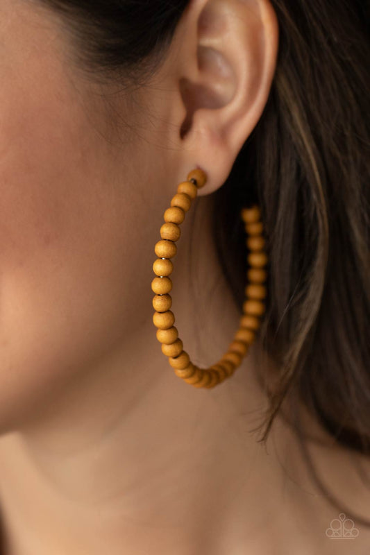 Should Have, Could Have, WOOD Have Brown Hoop Earring - Paparazzi Accessories  Brown wooden beads are threaded along a dainty wire, creating an earthy hoop. Earring attaches to a standard post fitting. Hoop measures approximately 2 1/2" in diameter.  All Paparazzi Accessories are lead free and nickel free!  Sold as one pair of hoop earrings.