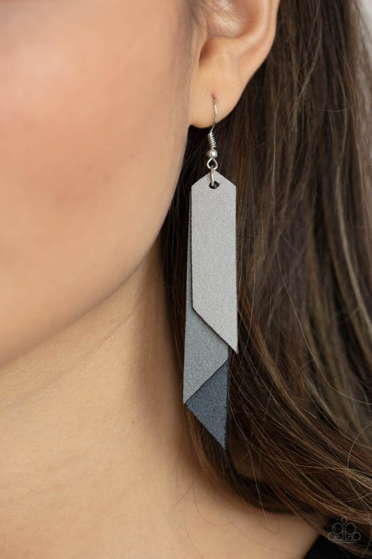 Suede Shade Silver Earring - Paparazzi Accessories Featuring angled edges, an ombre of gray suede leather frames layer into a tapered tassel for an earthy effect. Earring attaches to a standard fishhook fitting. ﻿All Paparazzi Accessories are lead free and nickel free! Sold as one pair of earrings.