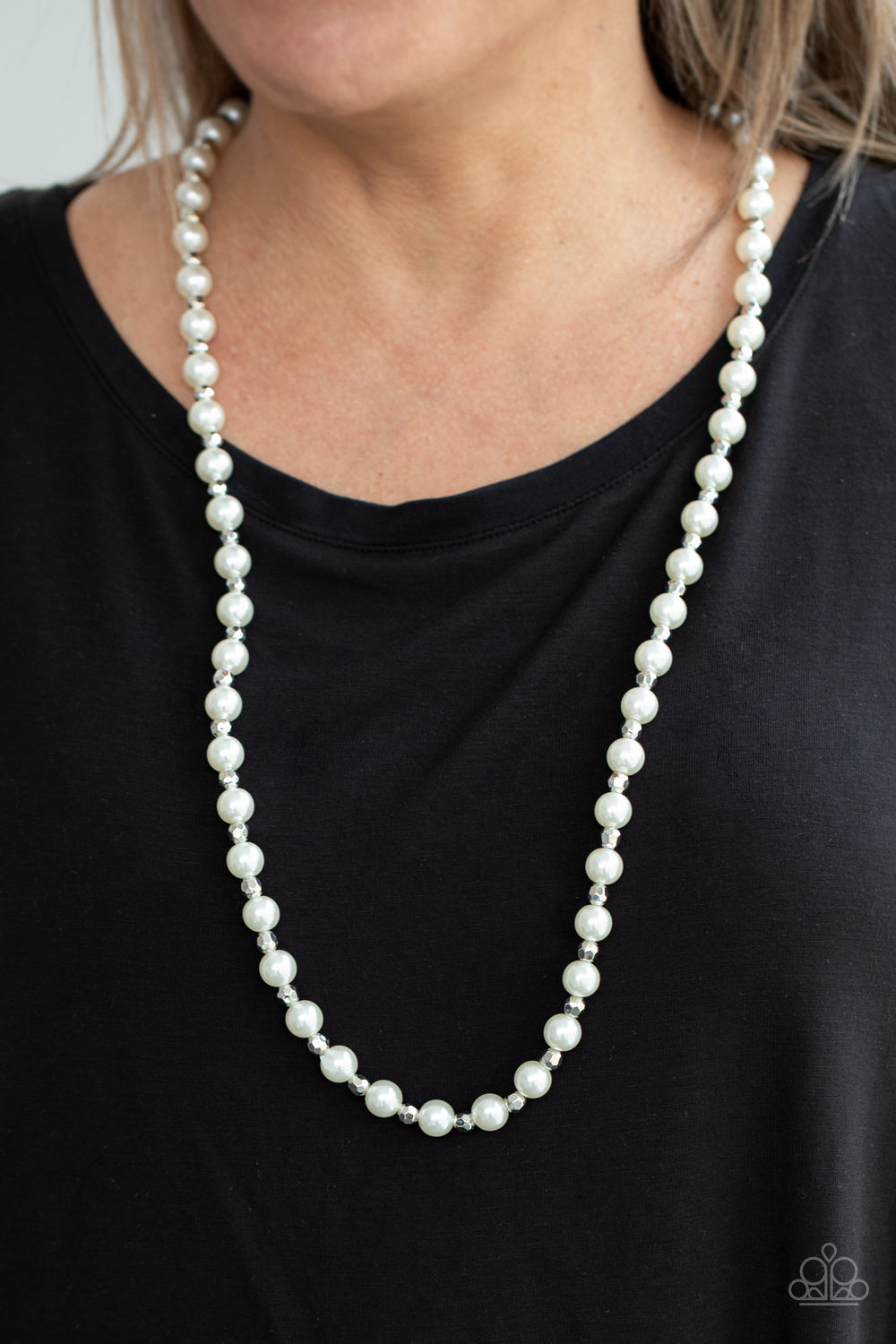 Nautical Novelty White Necklace - Paparazzi Accessories  Classic white pearls and faceted silver beads alternate along an invisible wire below the collar, creating a timeless twist. Features an adjustable clasp closure.  ﻿All Paparazzi Accessories are lead free and nickel free!  Sold as one individual necklace. Includes one pair of matching earrings.