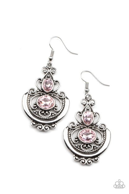 Unlimited Vacation Pink Earring - Paparazzi Accessories  Oval pink rhinestones embellish an ornate silver frame swirling with studded and textured silver filigree, coalescing into an elegant lure. Earring attaches to a standard fishhook fitting.  ﻿All Paparazzi Accessories are lead free and nickel free!  Sold as one pair of earrings.