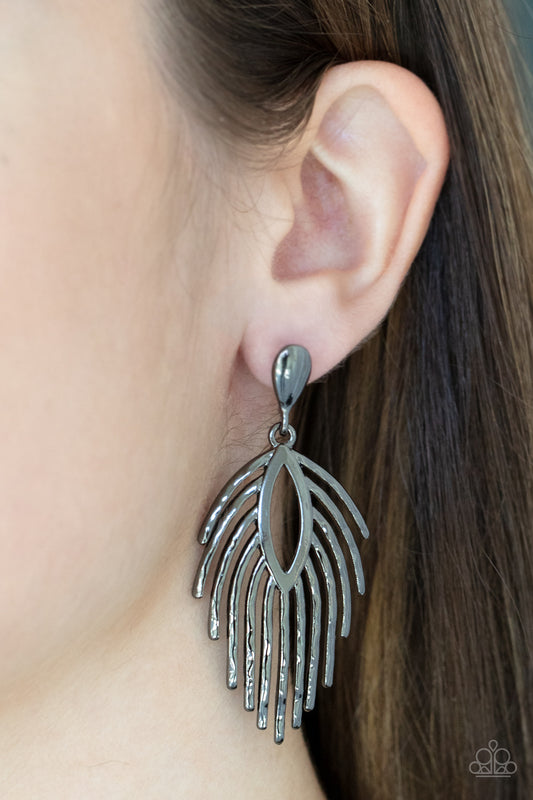 Metro Safari Black Post Earring - Paparazzi Accessories  Anchored by a solid gunmetal bulb, gunmetal bars flare out and fall like shooting stars from an open marquise frame creating a captivating allure. Earring attaches to a standard post fitting.  Sold as one pair of post earrings.