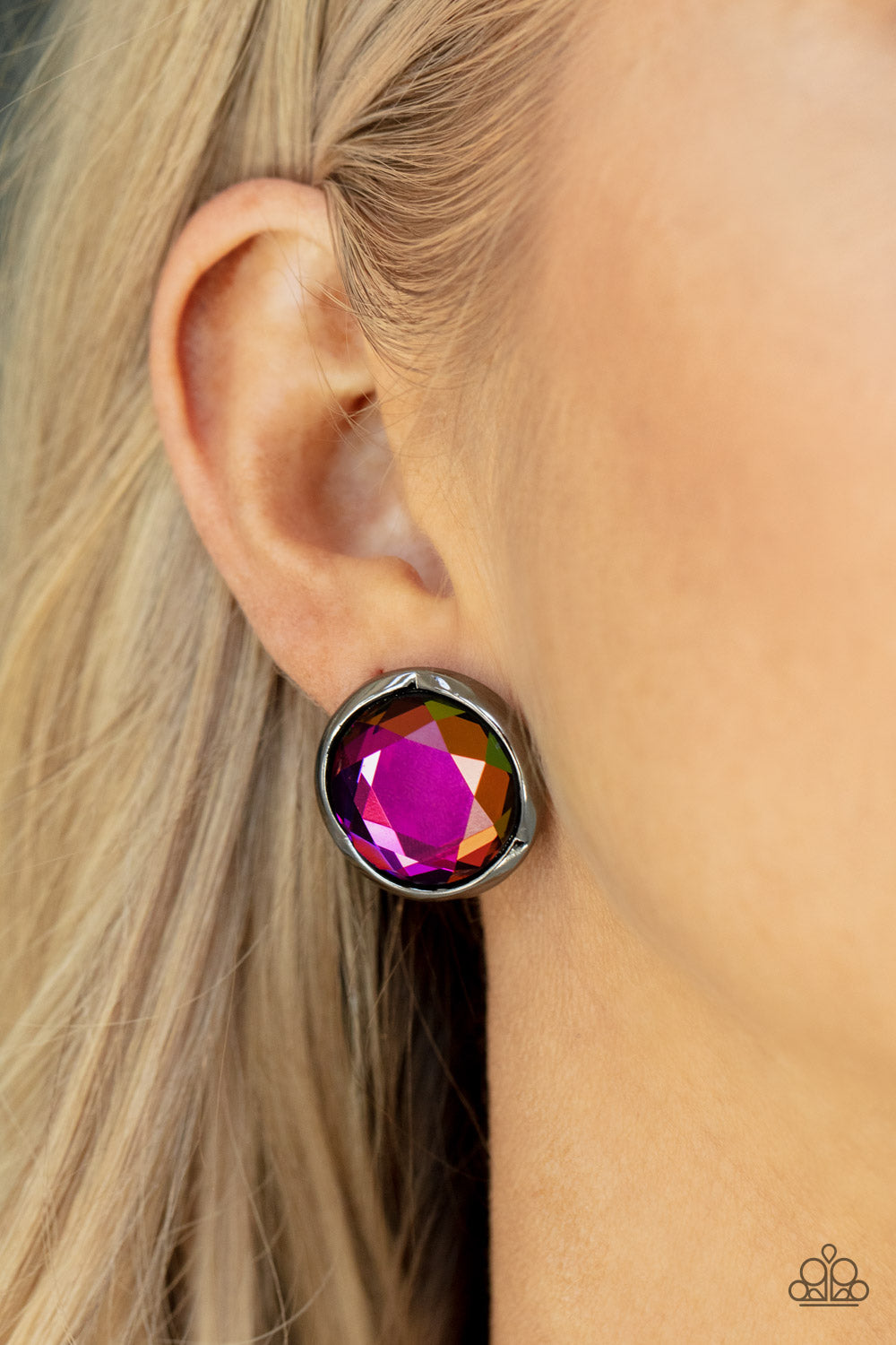 Double-Take Twinkle Oil Spill Post Earring - Paparazzi Accessories  Featuring a flashy faceted finish, an oversized oil spill gem is pressed into a sleek gunmetal fitting for a dramatic pop of dazzle. Earring attaches to a standard post fitting.  Sold as one pair of post earrings.