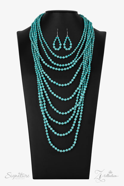 Intermixed with dainty silver beads, a groundbreaking display of refreshing turquoise stone beads gradually increases in size as they drape into artisan inspired layers down the chest. The trailblazing length combined with the authentic attitude of the piece creates an exaggerated, earthy statement. Features an adjustable clasp closure.   All Paparazzi Accessories are lead free and nickel free!