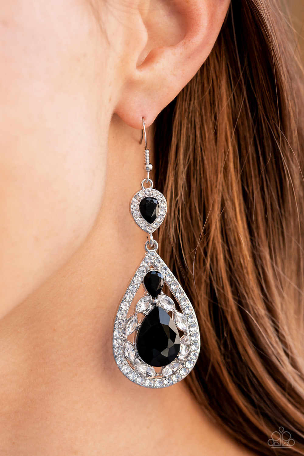 Posh Pageantry Black Earring - Paparazzi Accessories  Three teardrop black rhinestones adorn white rhinestone encrusted silver frames that link into an elegant teardrop lure for a flawless fashion. Earring attaches to a standard fishhook fitting.  Sold as one pair of earrings.