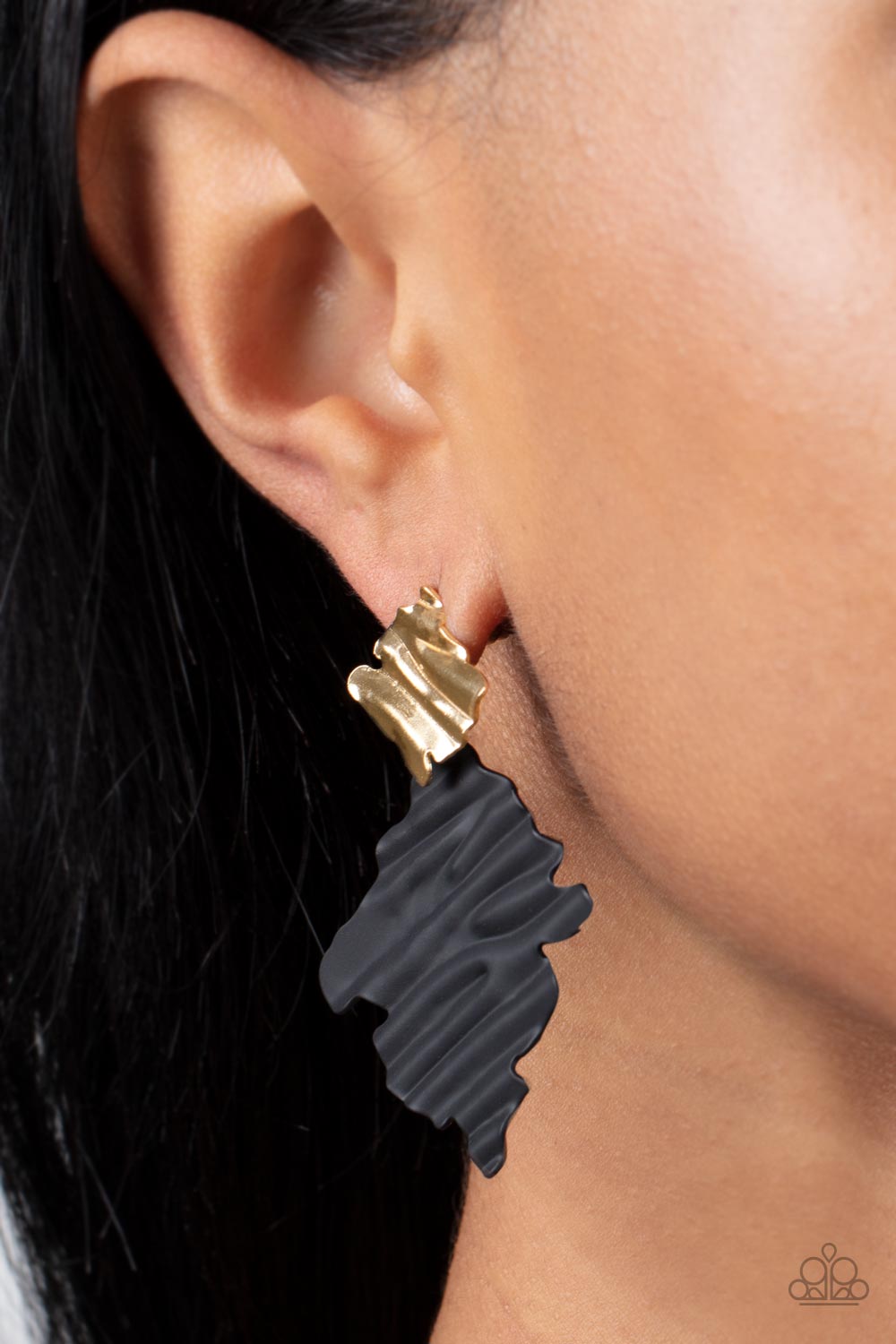 Crimped Couture Gold Post Earring - Paparazzi Accessories  Painted in a matte finish, a rippling black frame links to a dainty gold frame featuring crimped texture, resulting in a modern lure. Earring attaches to a standard post fitting.  Sold as one pair of post earrings.