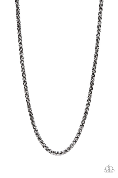 Metro Monopoly Black Urban Necklace - Paparazzi Accessories  A bold strand of gunmetal wheat chain drapes across the chest for an edgy urban fashion. Features an adjustable clasp closure.  Sold as one individual necklace.