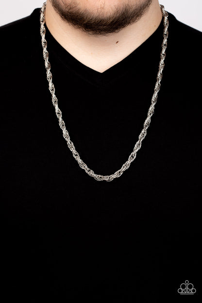 Pit Stop Silver Necklace - Paparazzi Accessories  Featuring diamond cut edges, oval silver links triple-link across the chest, resulting in an edgy statement. Features an adjustable clasp closure.  Sold as one individual necklace.