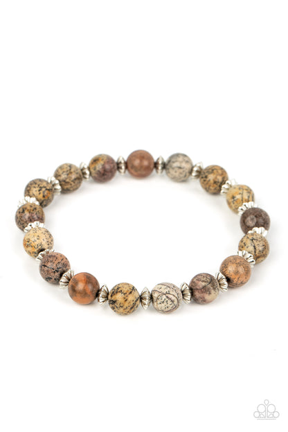 Keep The Peace Silver Urban Bracelet - Paparazzi Accessories  Infused with silver accents, an earthy collection of natural stones are threaded along a stretchy band around the wrist for a tranquil look.  Sold as one individual bracelet.