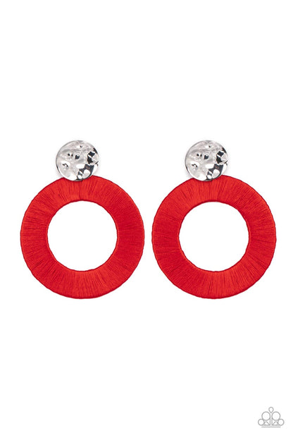 Strategically Sassy Red Earring - Paparazzi Accessories  A hammered silver disc gives way to an oversized metal hoop wrapped in fiery red thread, resulting in a modern lure. Earring attaches to a standard post fitting.  Sold as one pair of post earrings.