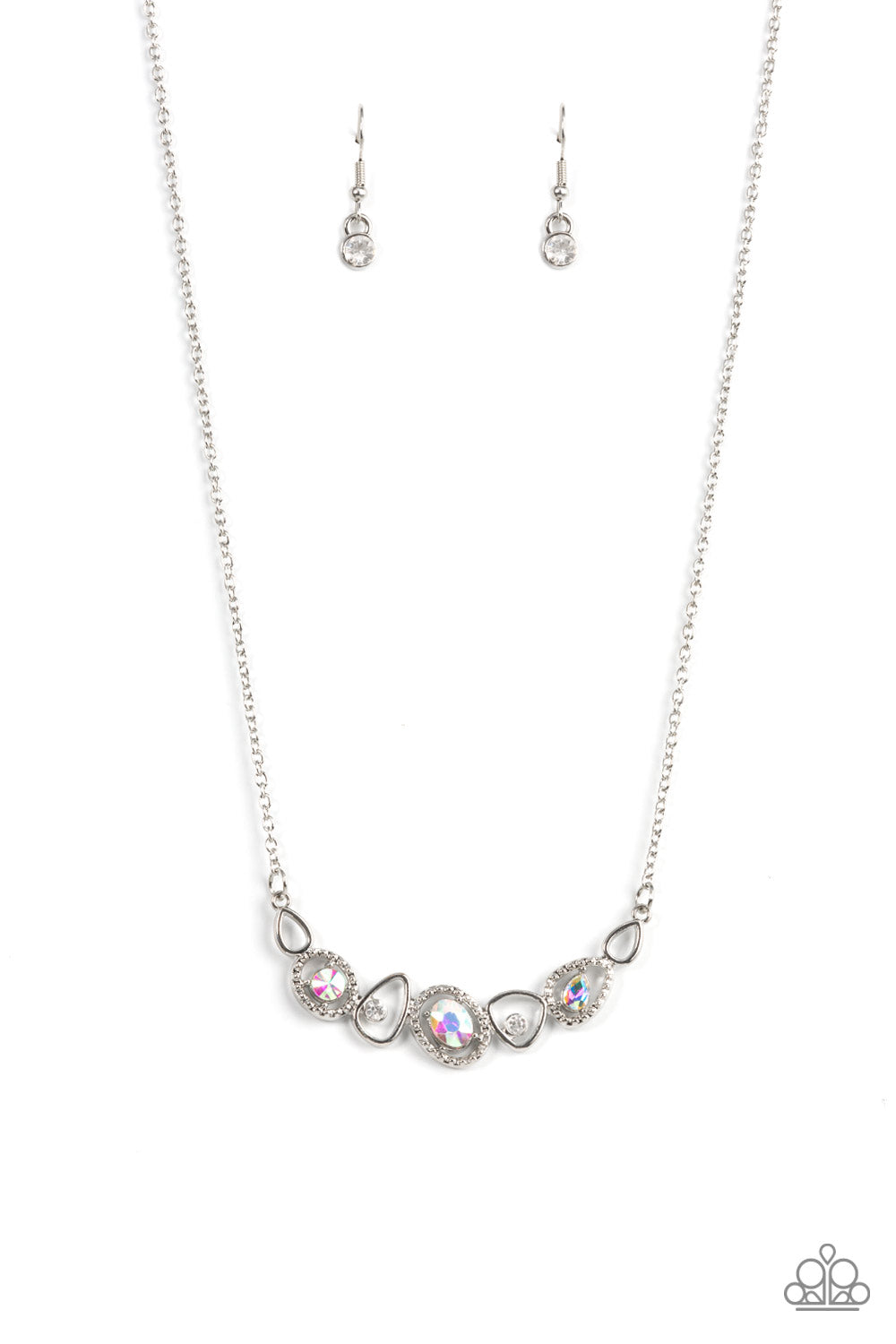 Celestial Cadence Multi Necklace - Paparazzi Accessories  An incandescent assortment of shiny silver frames, dainty white rhinestones, and oversized iridescent gems delicately coalesce into a statement-making sparkle below the collar. Features an adjustable clasp closure.  Sold as one individual necklace. Includes one pair of matching earrings.