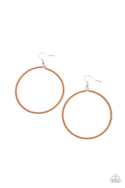 Basically Beaded - Brown Item #P5SE-BNXX-198XX Dainty brown seed beads are delicately threaded along a silver wire hoop, creating a neutral pop of color. Earring attaches to a standard fishhook fitting.  Sold as one pair of earrings.